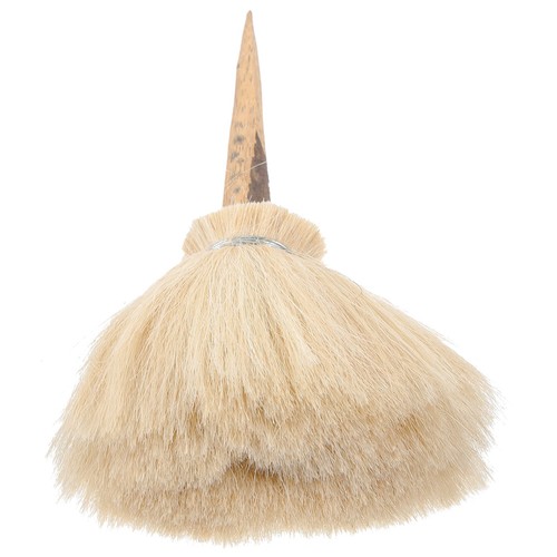 Daily use pottery brush - use,